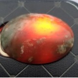 Red Nephrite Jade Oval Cabochon ( semi translucent)